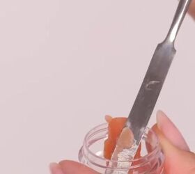 Putting lipstick into a clear container