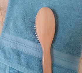 Hair brush drying on a towel