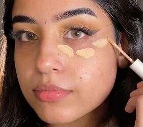 Applying concealer