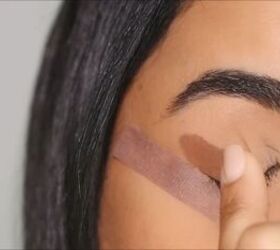 Applying eyeshadow 