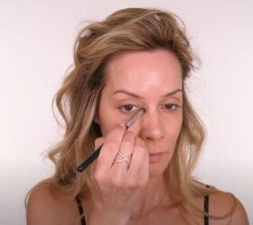 Applying concealer