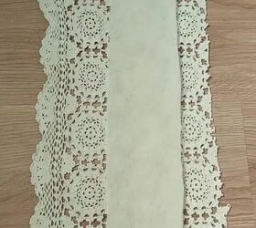 She puts a tie over a lace table runner to make something surprisingly stylish