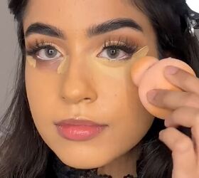 Applying foundation with a beauty blender