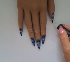 Creating a blue butterfly nail design