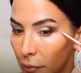 Applying concealer