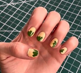 cute hack for summer nails, Painting green petals onto the nails