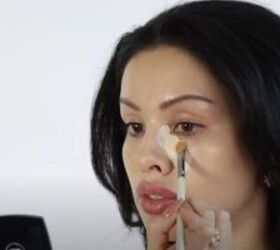 Applying concealer