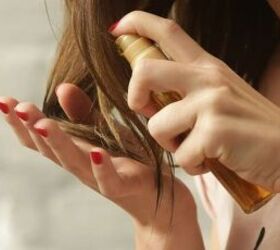 how to use olive oil for radiant skin and hair, Applying olive oil to the hair image via Canva