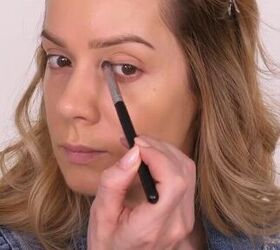 Applying concealer