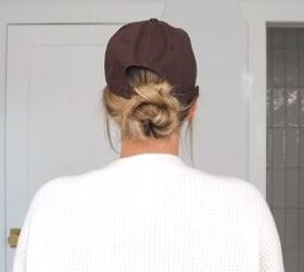 Braided bun hairstyle with a hat