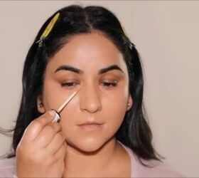 Applying concealer