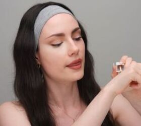 Applying concealer to the hand