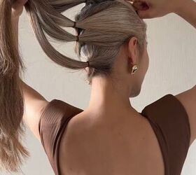 She makes 3 small ponytails like this to make this better-than-a-braid idea we can't stop thinking about