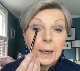 Applying eye makeup