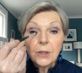 Applying eye makeup