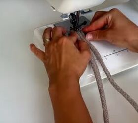 It just looks like two pieces of rope… until she stitches them together