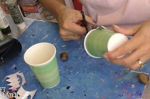 She cut a paper cup in half for this super cute craft idea