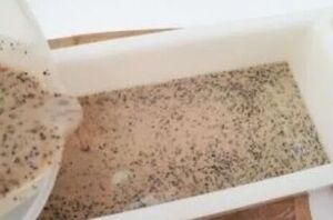 She pours coffee grounds and whole coffee beans into a mold for this refreshing idea