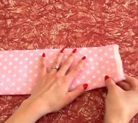 She folds over a strip of fabric like this to give her tops an adorable upgrade