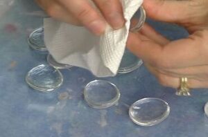 She rubs alcohol on glass gems for this ADORABLE idea