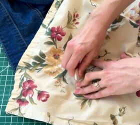 She places an old bedsheet over a denim jacket for this unbelievable idea