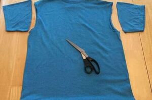 She cut the sleeves off of an old t-shirt for this crazy (and useful) creation