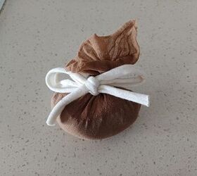 Pour baking soda into stockings and never worry about this closet issue again