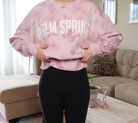 Pull the shirt up and over