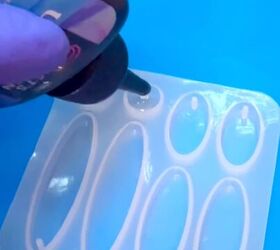 These pumpkin earrings were made with something you'd normally put on your nails