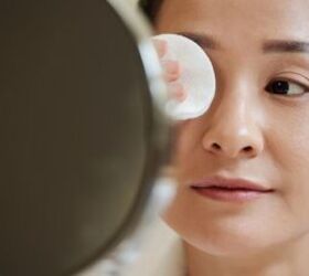 Woman removing makeup - image via Canva