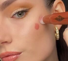 Stop blending your blush low — wear it up here for a softer glow