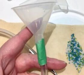 She clips a dinner napkin to this necklace when the lobster arrives