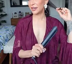 She rocks her straightener back and forth for this