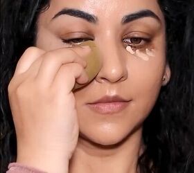She applies the darker concealer first