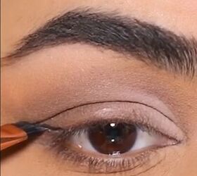 Drag your eyeliner downward for this soft wing