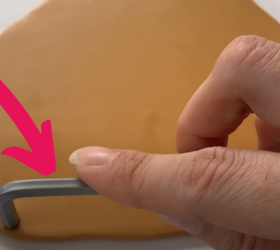 She presses a hex key into clay to make these seriously cute accessories