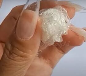 Roll Saran Wrap into a ball to make your nails look showstopping in 5 minutes