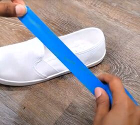 She tapes up a pair of white canvas shoes—3 steps later, they look so cool!