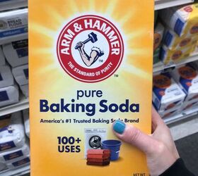 She puts baking soda on a toothbrush for this brilliant and money saving hack