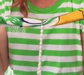 Watch what happens when you put a pearl necklace on a scarf like this