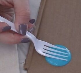 She dips a plastic fork in paint and turns it into something gorgeous