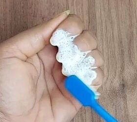 Brush white toothpaste on your fingernails, then leave it for 5 minutes
