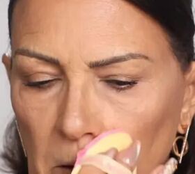 She powders this spot before putting on lipstick