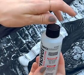 This is why she's dabbing nail polish remover onto an old t-shirt