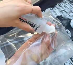The reason she's rubbing nail polish remover directly onto her t-shirt