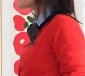 A red sweater and a black bow turn plain tan slacks into something far more fun