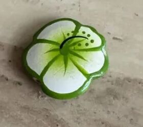 She found a wooden bead in a thrift-store bag and turned it into this