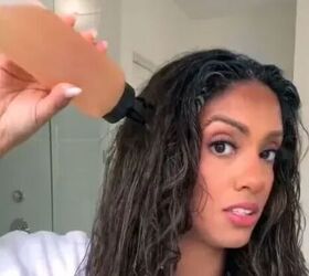 After she shampoos, she does this to her hair